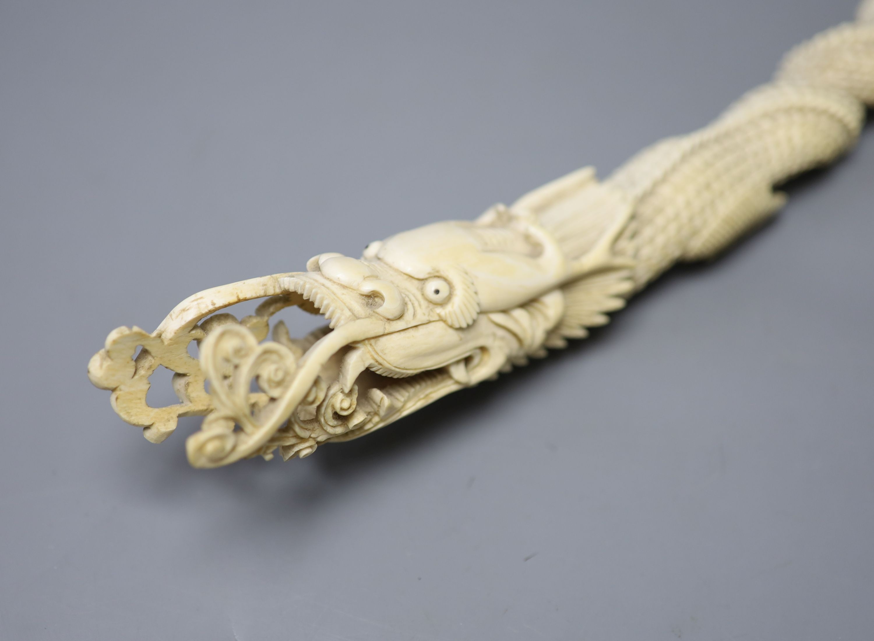 An Indonesian ivory carving of a dragon, first half of 20th century 52cm, , An Indonesian ivory carving of a dragon, first half of 20th century